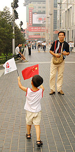 Beijing Olympics celebrations on Wangfujing in China's capital by Ron Gluckman
