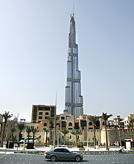 Burj Dubai, world's tallest building, towers over modern dubai, by Ron Gluckman