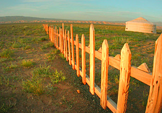 The Only fence in Mongolia  by Ron Gluckman