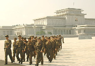 soldiers at Kim Il-Sung Kumsusan Mausolem  by Ron Gluckman in North Korea