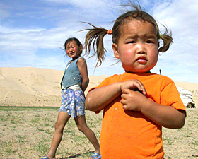 Mongolian children in the Gobi Desert  by Ron Gluckman